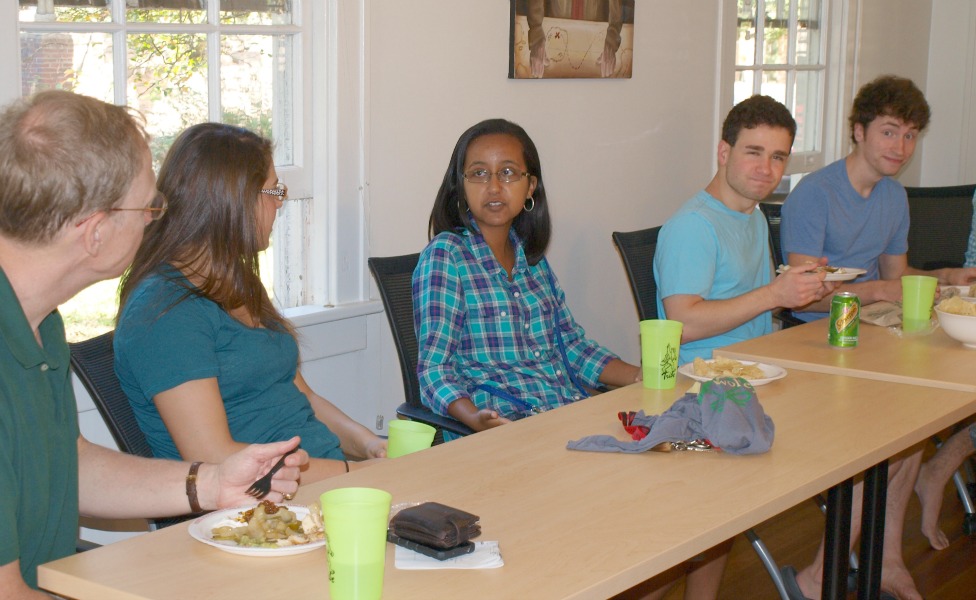 Bezi Yohannes '18 talks with Olivia Jebb '16 and her dad. Colin and Wade are thrilled to be in the picture